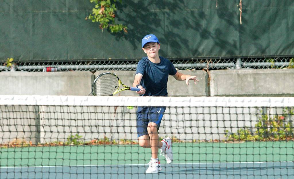 Spartans freshman Jett Peters went to a tiebreaker in set two, but picked up his first varsity win in singles against North Kitsap. (Mark Krulish/Kitsap News Group)