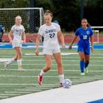 Junior midfielder Emily Fox keeps possession away from Bremerton. Fox scored the fifth and final goal of the game in the second half for Bainbridge.
