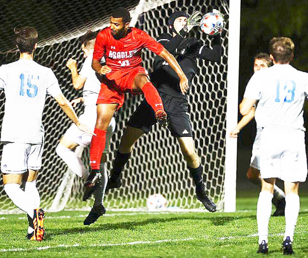 Goalie Quinn Millerd of Bainbridge Island makes a save for Drake against Bradley. Courtesy photo