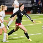 South Kitsap forward Maya Foster (8) chases down a loose ball in Tuesday nights home-opener against Graham-Kapowsin. (Mark Krulish | Kitsap News Group)