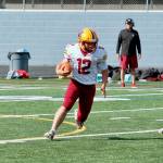 Kingston quarterback Brooks Arnim scored both touchdowns in the Bucs 27-13 loss to North Mason on Saturday. (Mark Krulish/Kitsap News Group)