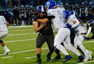 North Kitsap improved to 4-0 on the season with a 42-7 win over Olympic on Friday. (Mark Krulish/Kitsap News Group)