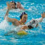 Finn Miller plays defense against his Mercer Island counterpart, Finn Friedland (7), in Monday nights water polo match agains the Islanders. Bainbridge won 17-8. (Mark Krulish/Kitsap News Group)