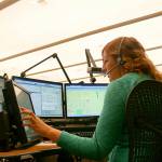 A Kitsap 911 operator mans the operations desk. (Courtesy photo)