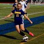 Savannah Mabee just manages to keep the ball in play.