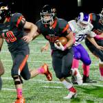 Central Kitsap running back Kouper Hall went over 1,000 rushing yards for the season against North Thurston on Friday night. He had 304 yards and four touchdowns in the 61-7 win. (Mark Krulish/Kitsap News Group)