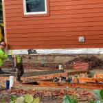 Construction workers set the first of six prefabricated modules that will create the Suquamish Tribe's Healing House health clinic. Courtesy photos