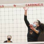 Marion Stejer, a Kingston senior, dinks the ball for a point against Lindbergh. Steve Powell/Kingston Community News photos