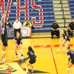 A birds-eye view shows North Kitsap getting into position as the ball comes over the net.