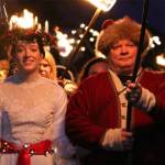 The Santa Lucia bride walks to light the ceremonial Viking bonfire at the 2019 Poulsbo Julefest.