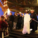 The Santa Lucia bride prepares to light the ceremonial bonfire at the 2019 Poulsbo Julefest. Herald file photos