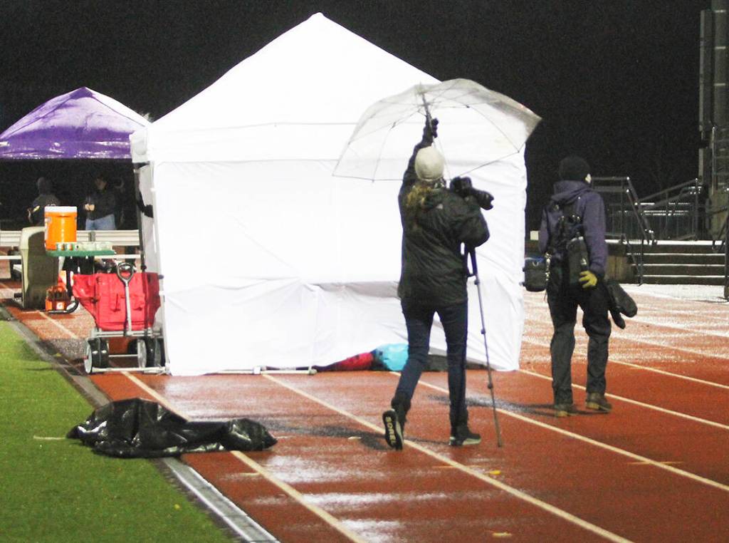 Tents and umbrellas didnt help much during the game as the winds blew them all around and rain was going sideways.