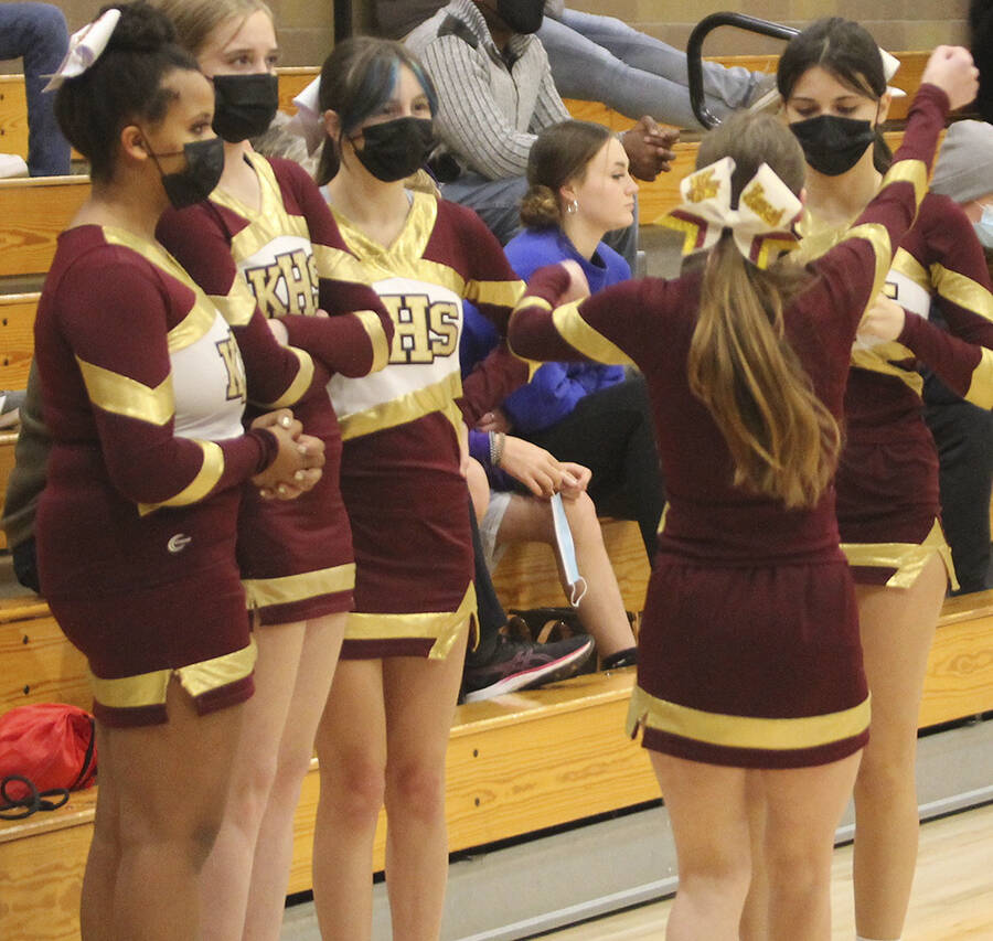 Kingstons cheerleaders still are wearing COVID-19 masks to start the season.