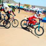 Christensen leads a pack of BMX riders down the track.