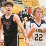 Brayden Morgan (22) of Bainbridge seems to agree with the call, while Jonas La Tour (4) of NK doesnt look too sure.