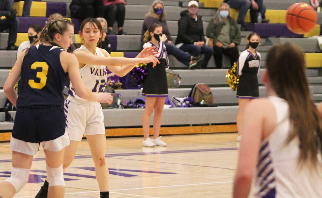 Jade Sunnenberg (12) of NK passes the ball against BI.