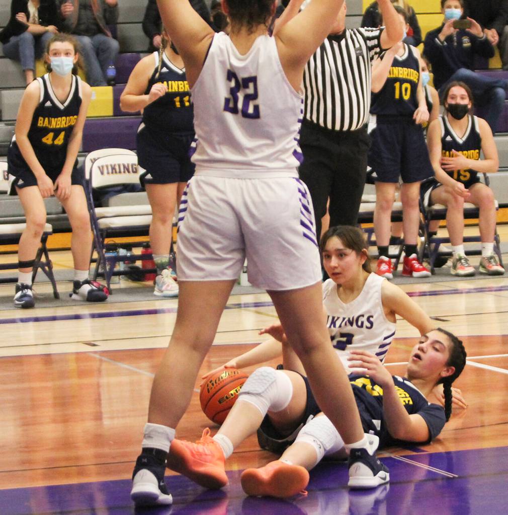 Jade Sunnenberg (12) of NK hits the floor with Ghadir Ramadan of BHS as they try to come up with a loose ball.