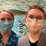 Nicole Geffrey, RN, stands next to Emily Busha (at right) at Mary Bridge Childrens Hospital in Tacoma. Geffrey once was part of the medical team that took care of Busha while she was treated for a serious, chronic condition. (Courtesy photo)