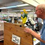 Customer Laura Reedy to retiring pharmacist Ken Paskett: Ken, you cant leave us! she said with a smile. What will we do without you? (Bob Smith | Kitsap Daily News)