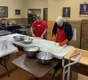 Sons of Norway volunteers prepare lutefisk for the organizations annual dinner. Courtesy photo