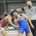 Monica Kaiser of South Kitsap breaks away from Aubrie Auklands control.