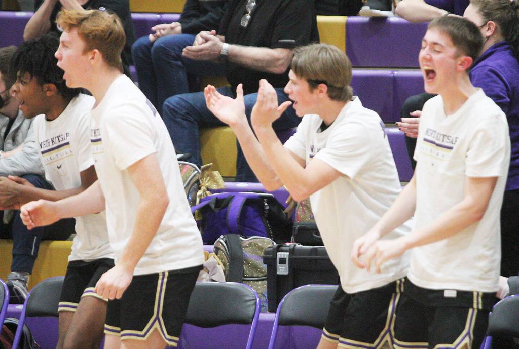 Players on the bench erupt with cheers as North Kitsap started to pull away at the end of the game.
