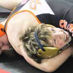 Steve Powell | Kitsap News Group
Quentin Lawrence of Central Kitsap pins Justin Broxton of Kelso at state over the weekend.