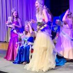 A stunned Rebecca Greenberg (sitting on throne) is crowned Fathoms O Fun Festivals Queen and her fellow contestants quickly gather around to congratulate her. (Bob Smith | Kitsap Daily News)