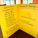 A greeting card from 10 of Alexandra Kusheretss Southworth neighbors welcomes her sisters family to the United States. The families generously provided bicycles, helmets, clothing, bedding and gift cards for Dasha Kusheretss young sons as they seek to get integrated into American life. The Ukrainian familys future is clouded, however.