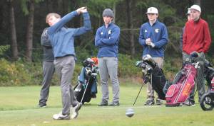 Owen Scheer tees off for Bainbridge in a match at Kingston. Steve Powell/Bainbridge Island Review Photos
