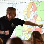 Nancy Treder/North Kitsap Herald
Poulsbo Fire Department Captain Jake Gillanders points to a location on a map of Europe.