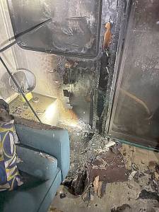 Damage from a Monday night boat fire was limited thanks to early reporting from bystanders and fast response from NKF&R firefighters. Courtesy Photos