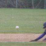 Kingston second baseman Terefa Rutherford waits for the throw from the catcher as Alex Elton of North Kitsap steals the base.