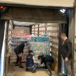 More than 100 tons of supplies for refugees are loaded on a semi-trailer in Moldova. (Courtesy photo)