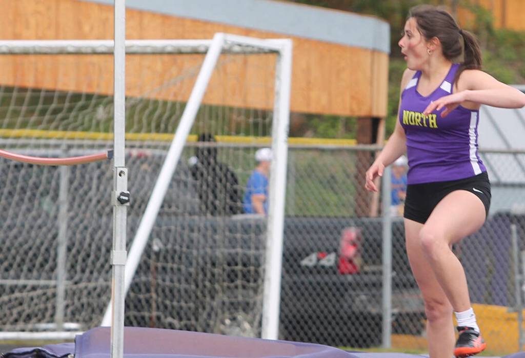 Steph Lara of NK is excited about the bar staying up during her high jump at a recent track meet.