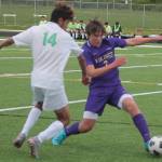 Sophomore midfielder Mason Chmielewski (2) of NK dribbles past a Warrior in their game Tuesday.