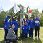 Peace Run team members visit the peace pole erected in honor of their 2018 visit to Kingston Middle School.