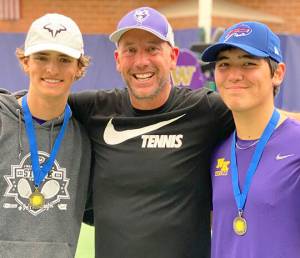 State champs Josh Smith and Drake Jones with coach Jay DeVries in the middle. Courtesy Photo
