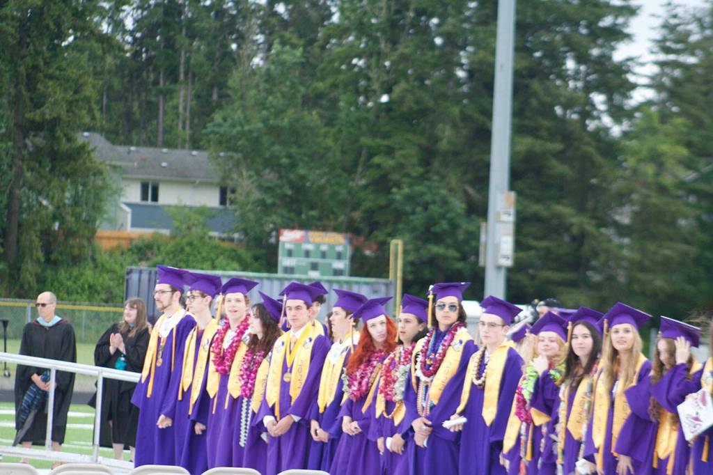 When the graduates first came out onto the field it wasn't raining.