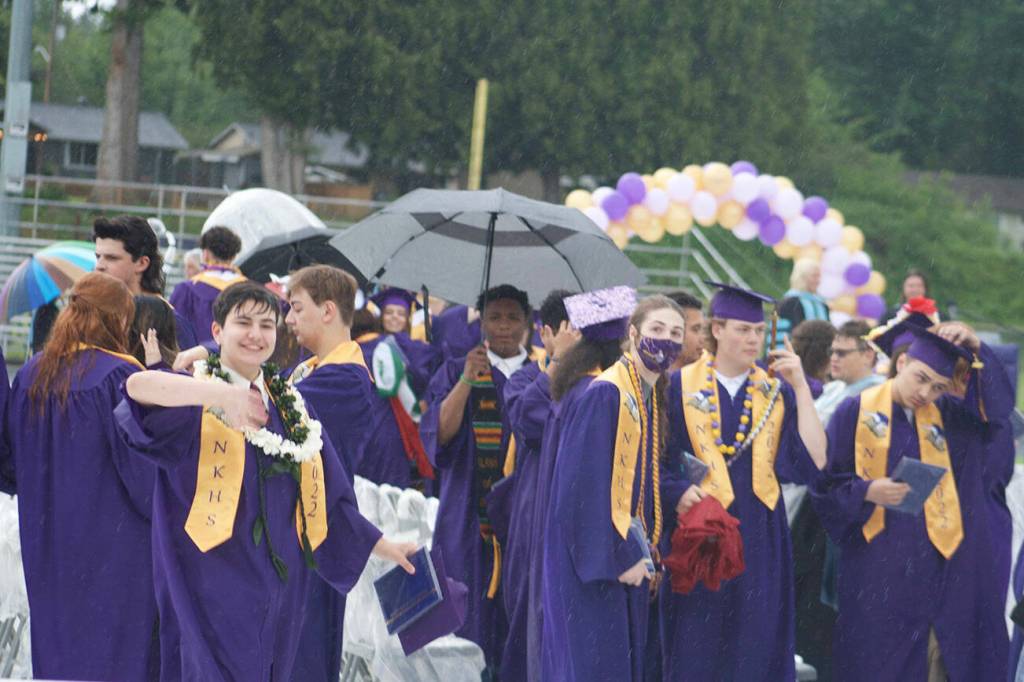 Graduates celebrate after the ceremony.
