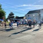 Supporters of political candidates gather together to march in the Fathoms O Fun Grand Parade in Port Orchard on June 25. (Bob Smith | Kitsap News Group)