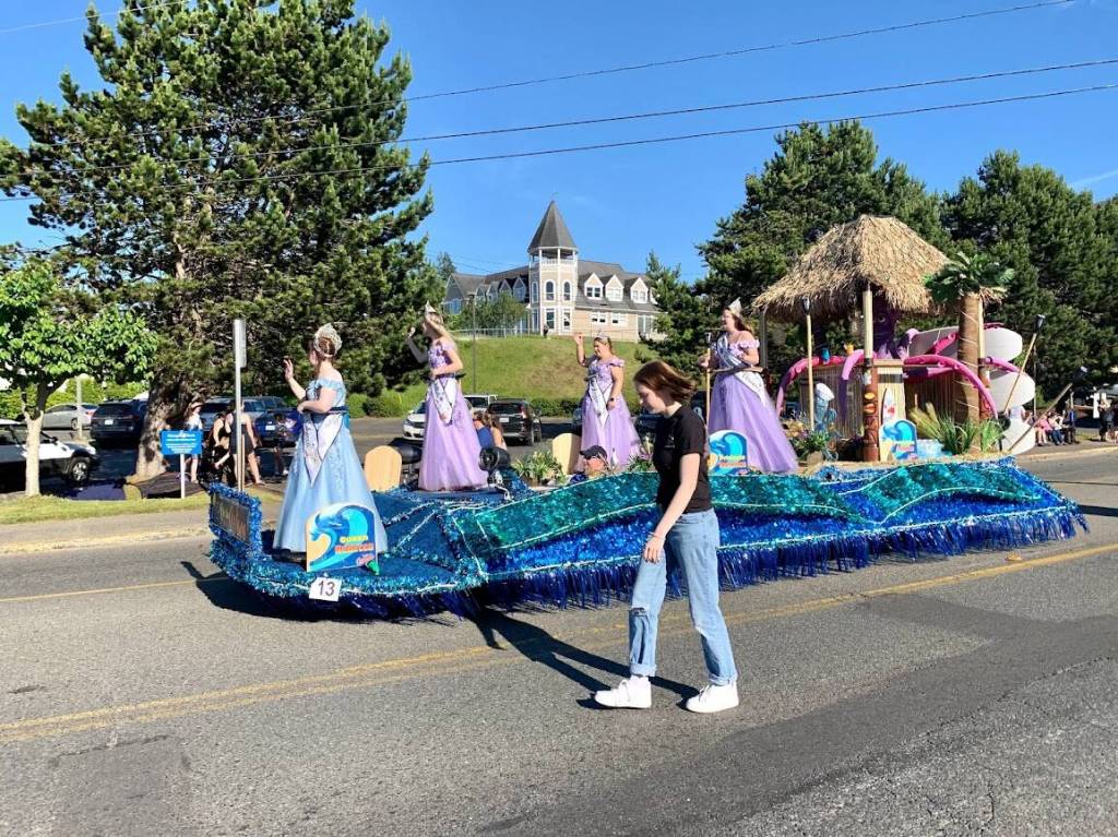 The Fathoms O Fun Royalty Court rides atop the festivals float on Saturday. (Bob Smith | Kitsap News Group)