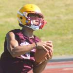 Kingston sophomore Dewaun Swan catches a pass.