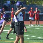 NK quarterback Beau Pharmann motions to a receiver.