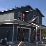 Volunteers continue work on one of the houses in the Sherman Ridge community.