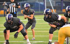 Cole Edwards led the North Kitsap Vikings to their final touchdown with a handful of passes and quarterback runs. Nicholas Zeller-Singh/North Kitsap Herald Photos