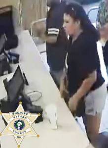 Detectives are seeking this woman, who was seen with the man alleged to have killed an Olalla couple.