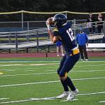 Bainbridges tight end Luca Scheltens moves the ball downfield after catching the pass from Jack Grant.