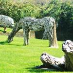 Animal artwork adorns the lighthouse yard.