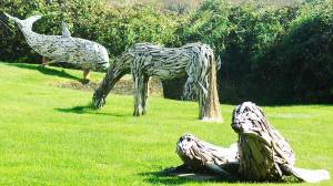 Animal artwork adorns the lighthouse yard.